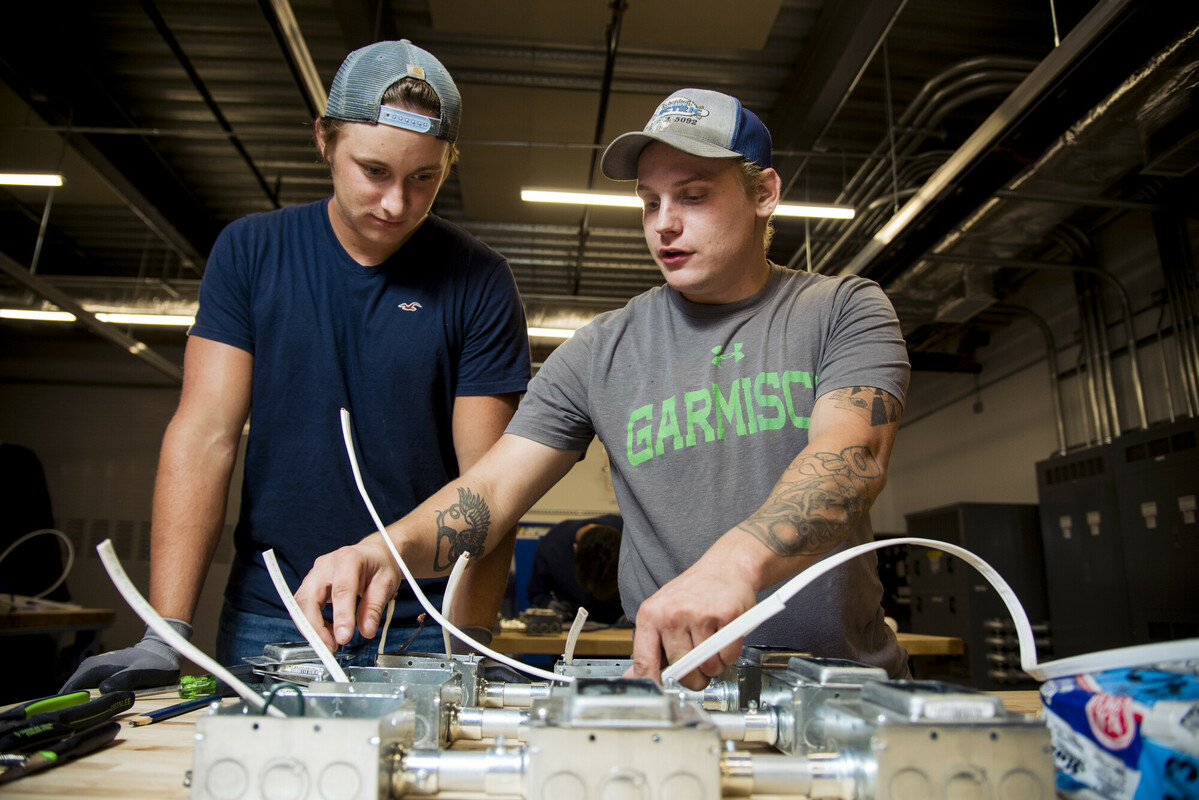 Students working on electrical board