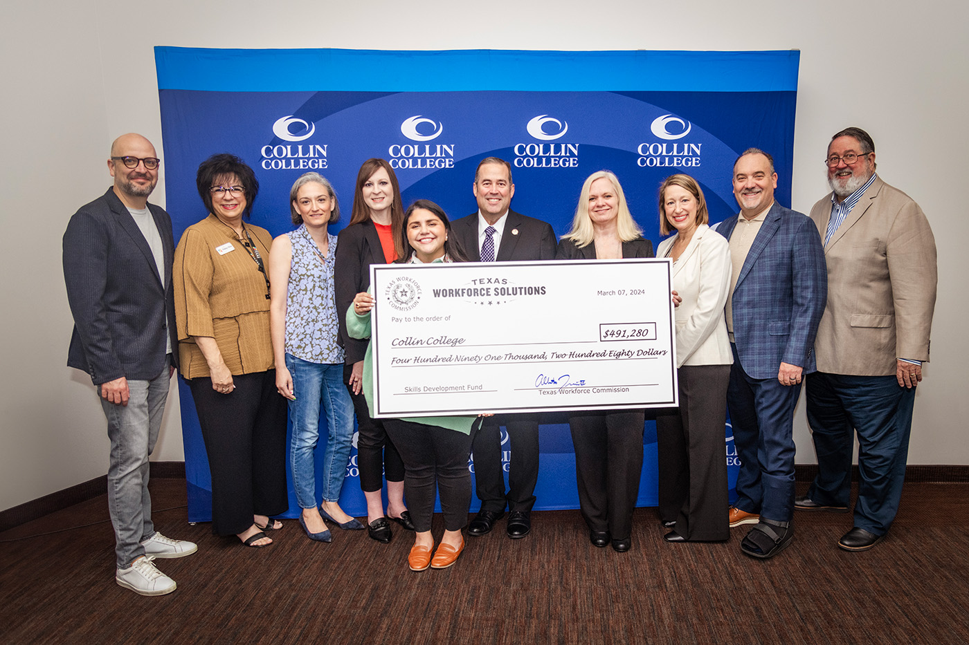 Representatives from Collin College, the Credit Union of Texas, and Advanced Fixtures Inc. attended the Skills Development Fund grant award event. Pictured are (from left) Credit Union of Texas representatives Chief Marketing and Engagement Officer Eddie Army, Executive Director Charitable Foundation Tracey Cline, Senior Vice President/Chief Operating Officer Angela Faust, Chief Retail Officer Courtney Coss, Manager of Learning and Projects Darlene Perdue; TWC Commissioner Alberto Treviño III; Advanced Fixtures Inc. representatives HR Coordinator Lavonda Griffith, Chief Financial Officer Stefanie Hurst, President Tony Ewing; and Collin College District President Dr. Neil Matkin.