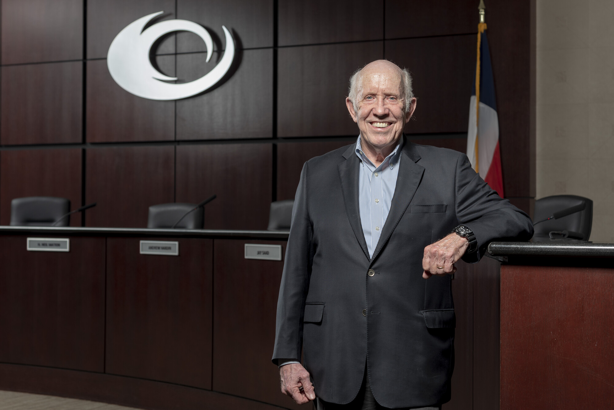 Bob Collins standing in board room