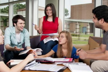 Students on campus in library