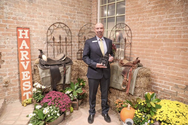 Dr. Mark Smith, provost of McKinney Campus, accepted the Inspiring Service to Others Award at the Spirit of McKinney awards ceremony. Photo by Bruce Quernrmoen